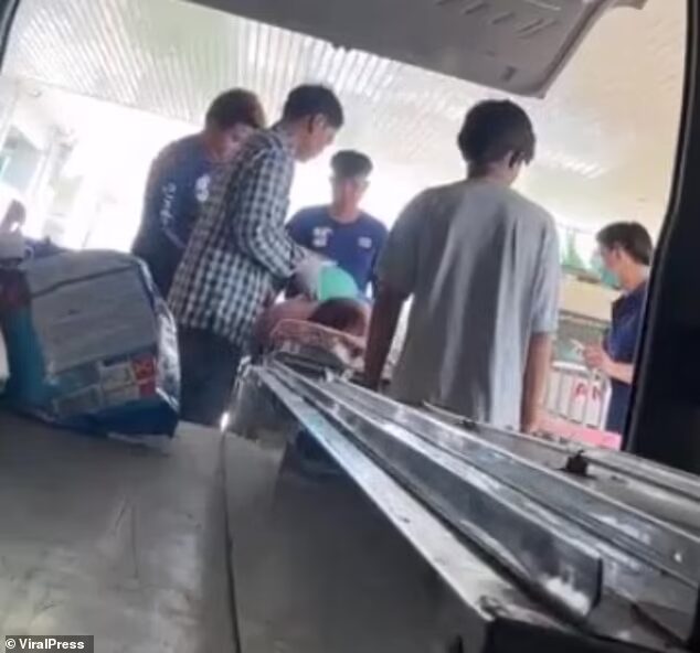 72747097-12254287-The_van_carrying_Chataporn_s_body_was_diverted_from_their_home_t-m-2_1688257374255