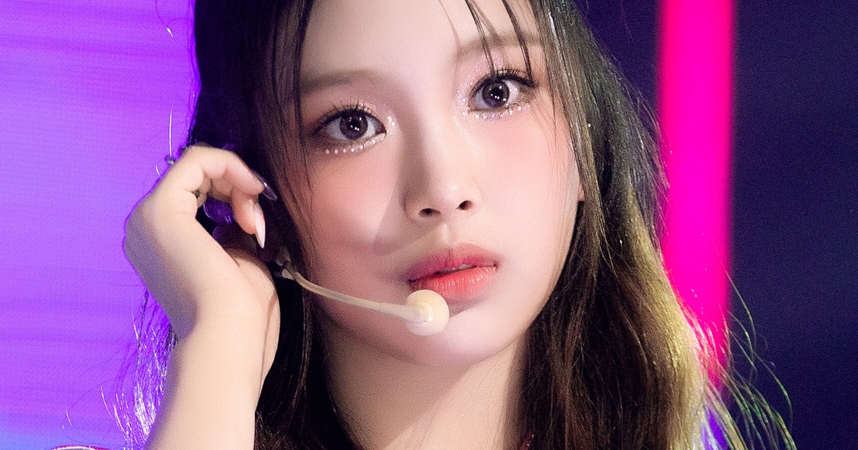 The NewJeans logo with haerin in the foreground reflects the growing concern among fans