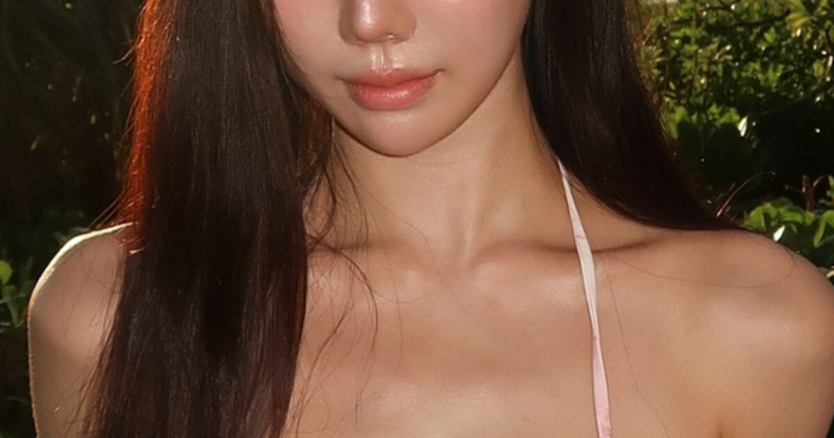 Karina-Lookalike Model Shows Off Her Voluptuous Figure In A Teeny Tiny Bikini