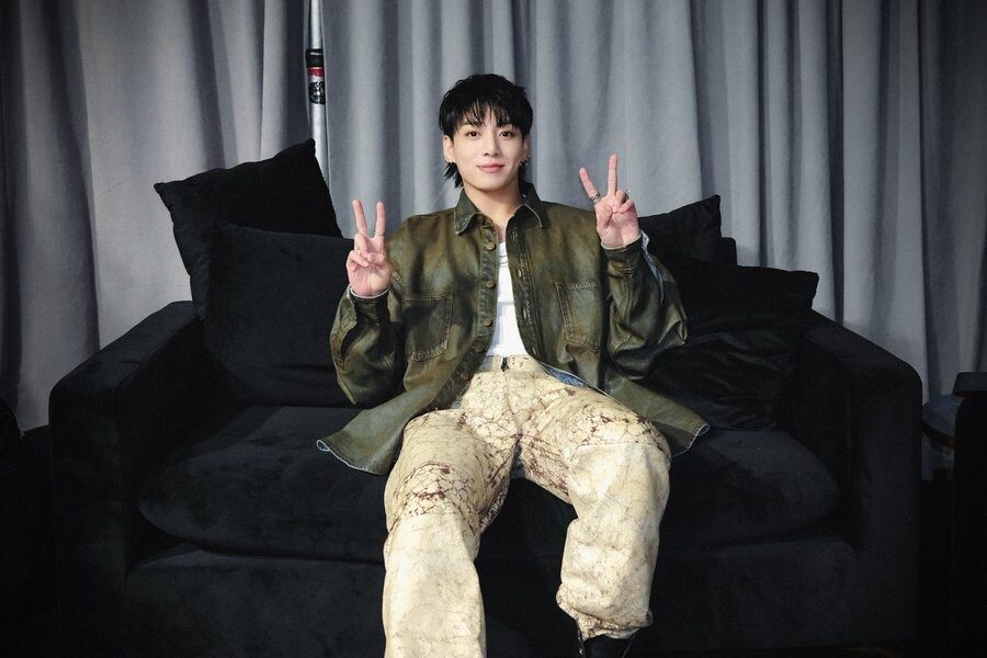 Jungkook makes a Mamma Mia gesture