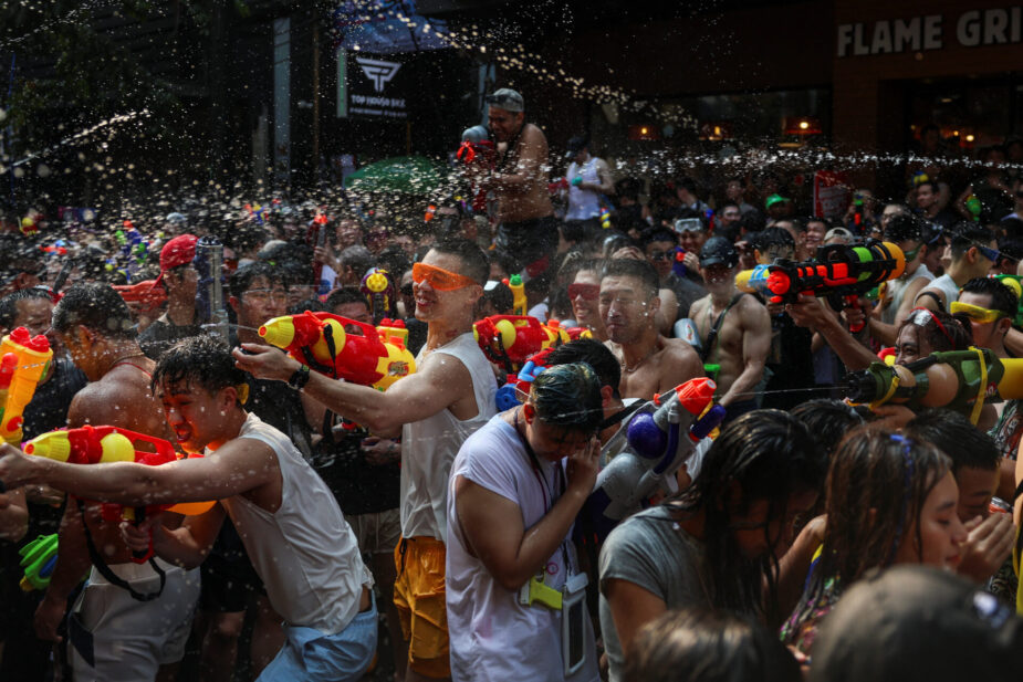 Tourists and local people celebrate New Year Water Festival in Bangkok