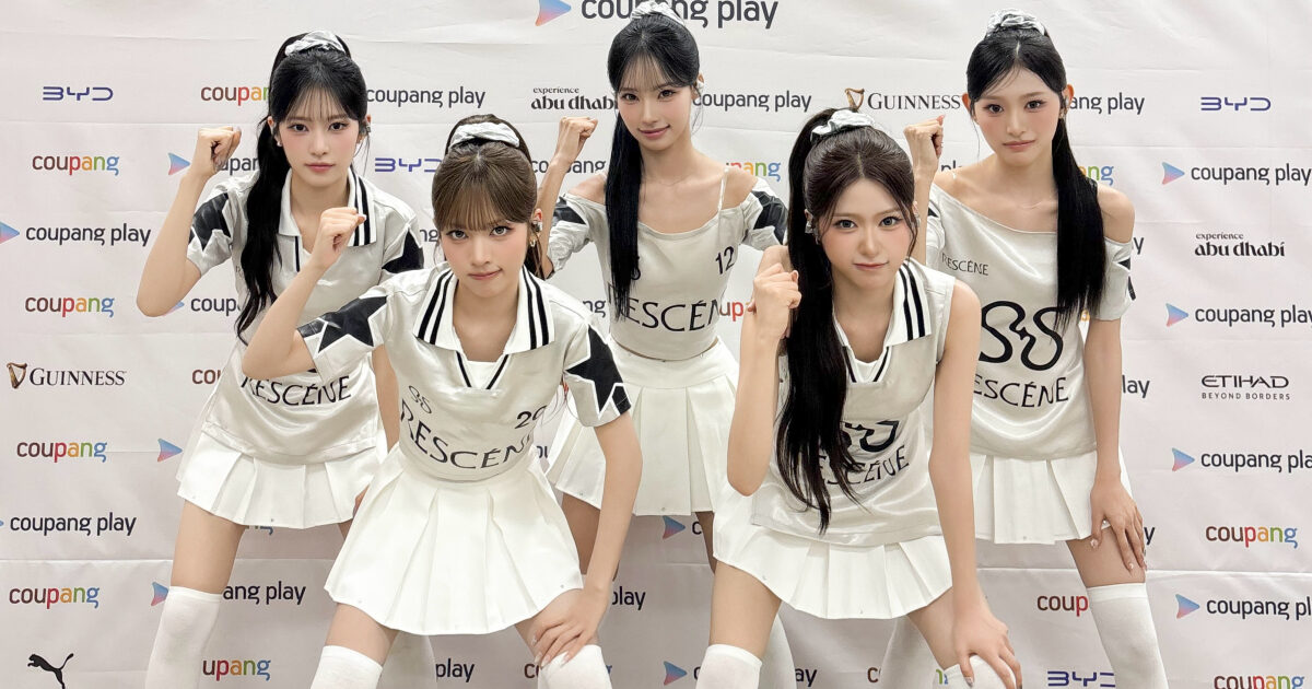 Members of the K-pop group RESCENE discussing their career growth and newfound popularity