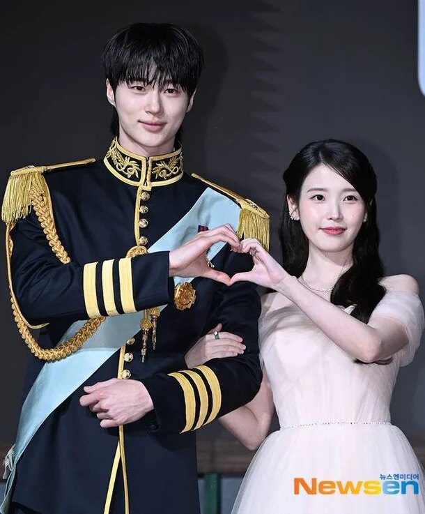 IU Called Out For Playing Coy Towards Popular Male Actor, Sparks Backlash